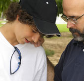 father and son talking