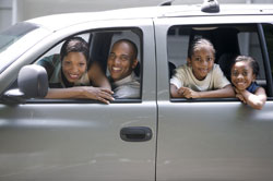 Family with Children Traveling in a Car