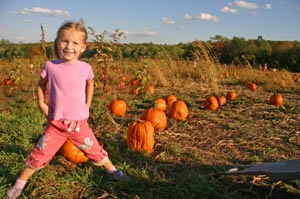 Girl in Pumpkin Patch