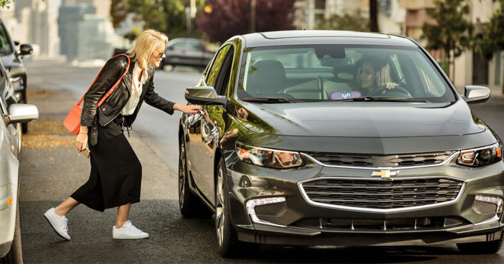 a woman getting into a Lyft car