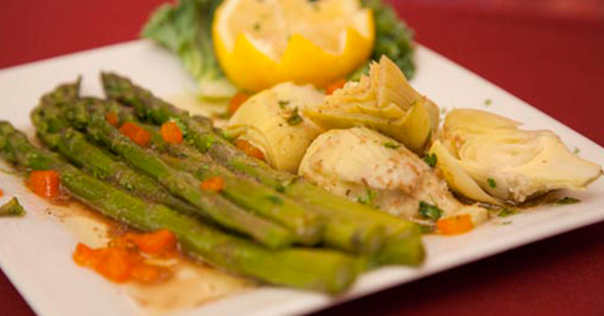 asparagus and other food on a plate