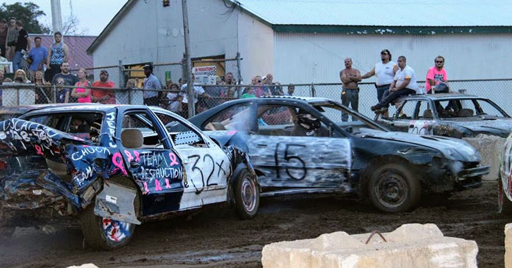 a car crashing into another car at a demolition derby