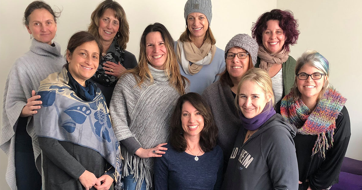 group photo of female yoga teachers