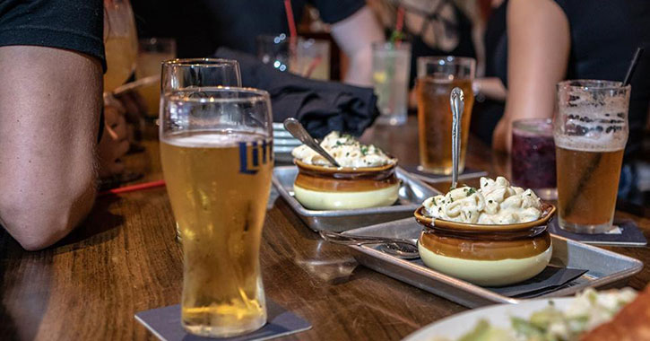 beer and mac and cheese on bar