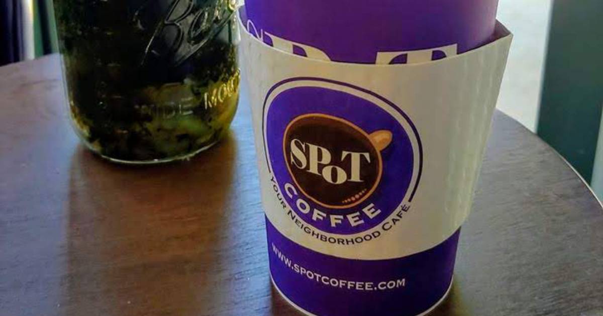 SPoT coffee in purple cup