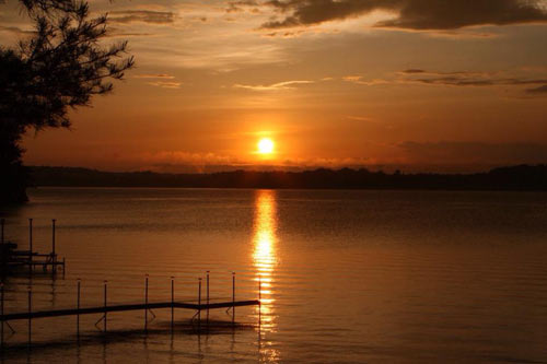 orange sunset over a lake