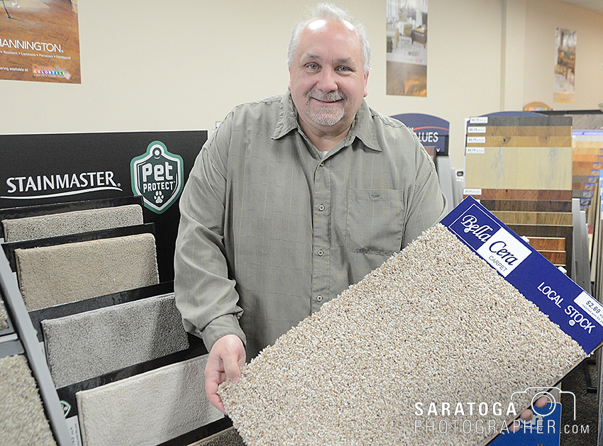 Paul Mastroieni was working in the financial field after giving up a six-store group of flooring outlets. He has left that field and opened the Floor Store in the Shops of Malta. ©2016 Saratoga Photographer.com